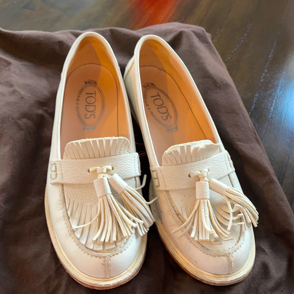 Lightly worn Tods white loafer